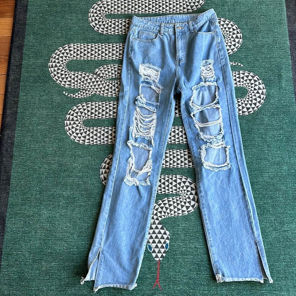 Straight legged ripped jeans